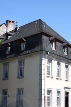 A slate roof with Windows and dormers