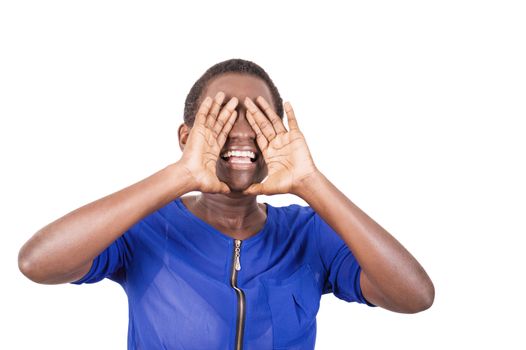 Young woman shouting to be heard by her colleagues