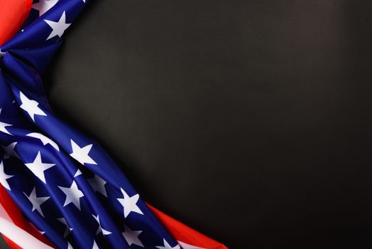 Martin luther king day, flat lay top view, American flag democracy on black background with copy space for your text