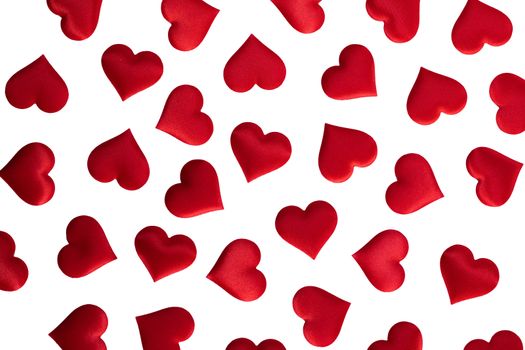 Valentine's day many red silk hearts isolated on white background, love concept