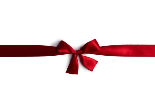 Red satin ribbon bow isolated on white background