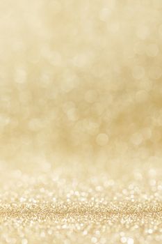 Shiny golden bokeh glitter lights abstract background, Christmas New Year party celebration concept