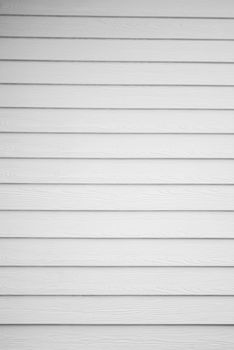 White painted wooden house wall.White plank background.
