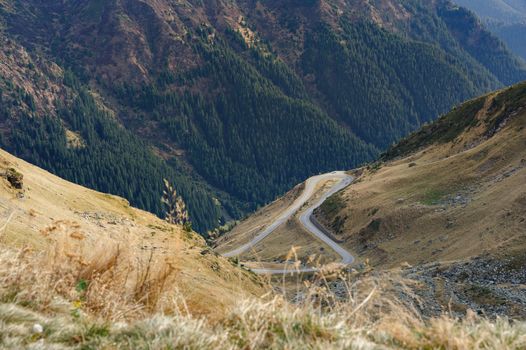 View to Transfagarasan road. It is a paved mountain road crossing the southern section of the Carpathian Mountains of Romania. It has national-road ranking and is the second-highest paved road in the country after the Transalpina.