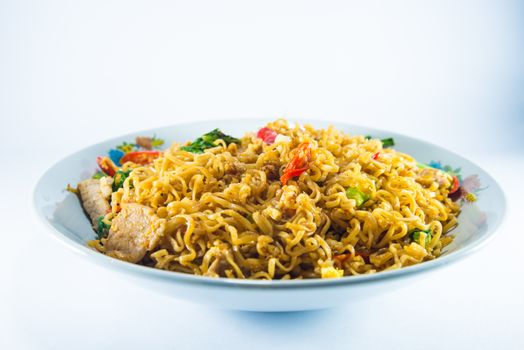 fried noodles on white background.