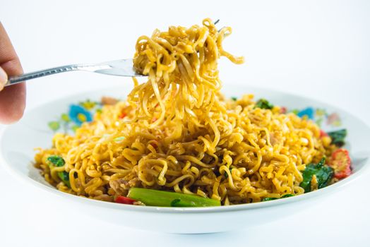 fried noodles on white background.