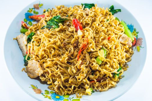 fried noodles on white background.