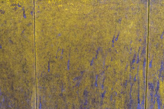 Oil slick on old wooden door for background.
