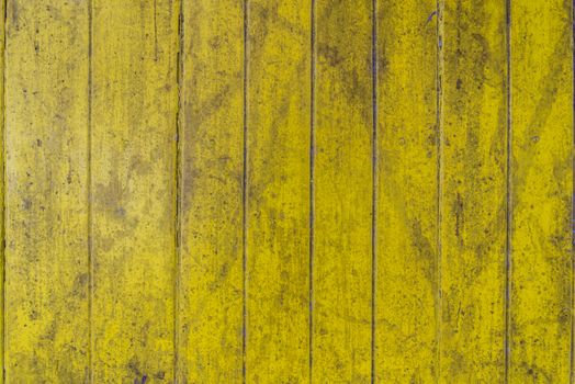 Oil slick on old wooden door for background.