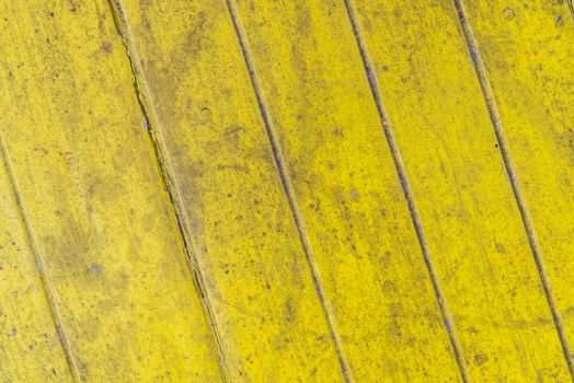 Oil slick on old wooden door for background.