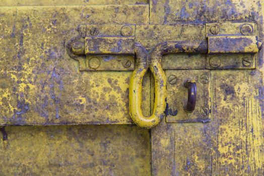 Oil slick on old wooden door for background.