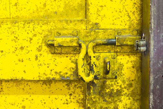 Oil slick on old wooden door for background.
