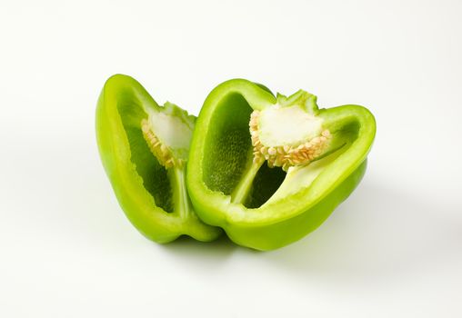 Halved raw green bell pepper