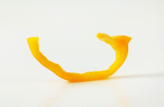 Thin slice of yellow bell pepper
