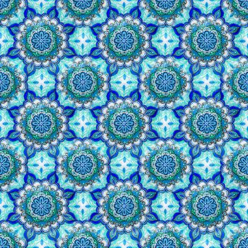Seamless background from a set of decorative ceramic dishes hand-painted with acrylic paints with a floral pattern.