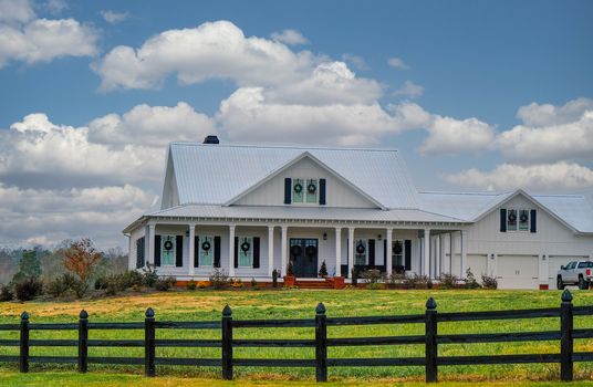 Christmas Ranch House Beyond Wood Fence