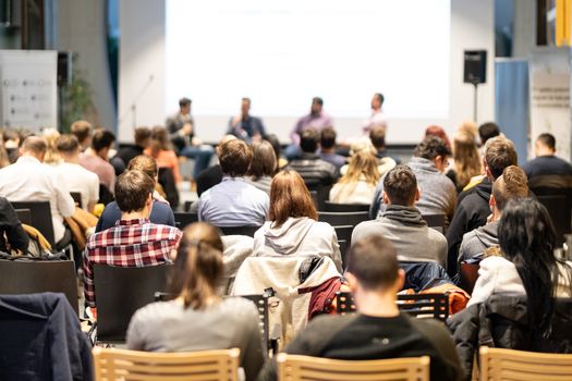 Round table discussion at business convention and Presentation. Audience at the conference hall. Business and entrepreneurship symposium.
