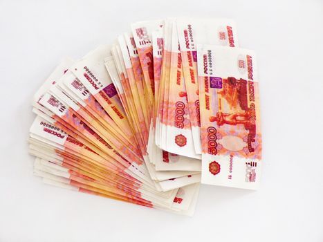 Money isolated on a white background. A lot of Russian banknotes. Fan of banknotes. Mortgage or loan. Debt. Wages. Steal money.