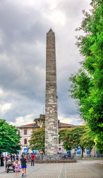 Istambul, Turkey – 07.12.2019. Constantine Obelisk in the Hippodrome of Istanbul, Turkey, on a cloudy summer day.