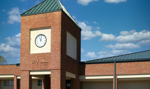 Clock on City Hall in Modern Brick Building