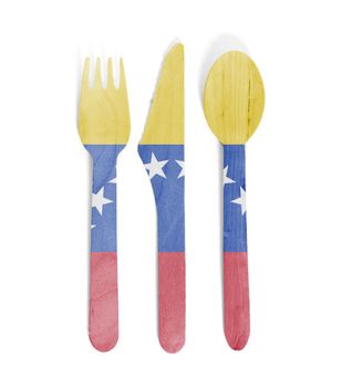 Eco friendly wooden cutlery - Plastic free concept - Isolated - Flag of Venezuela