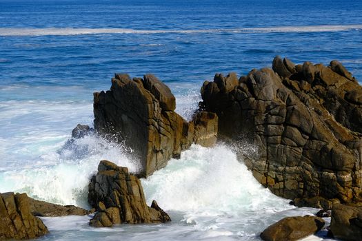 Surf Crashing into Massive Stone in Monterey