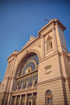 Side view of the main entrance of Keleti Railway Station in Budapest, Hungary with clear blue sky in the background. Eastern railway station in Budapest.