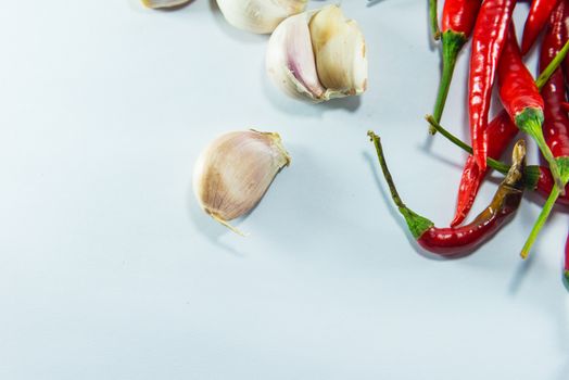 Red hot chilli and garlic  on white background