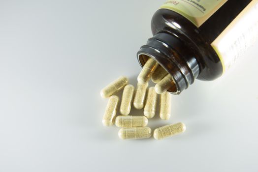 Many pills and tablets isolated on white background