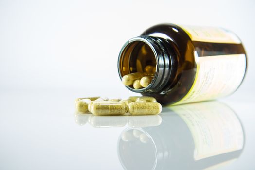 Many pills and tablets isolated on white background