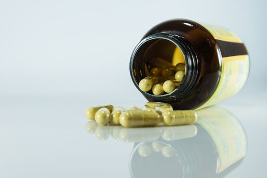 Many pills and tablets isolated on white background