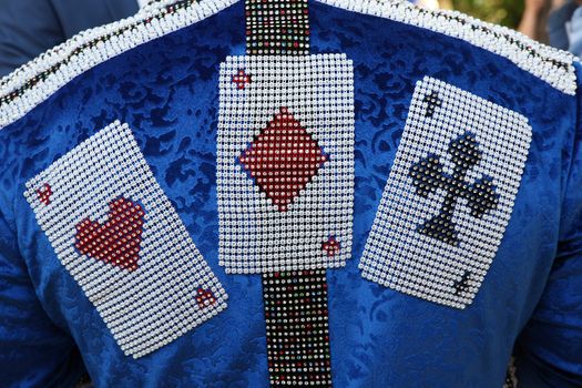 Jacket with print in the form of playing cards of the three suits