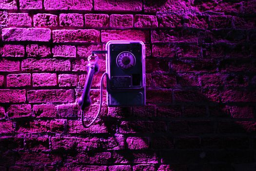 Phone on the brick wall