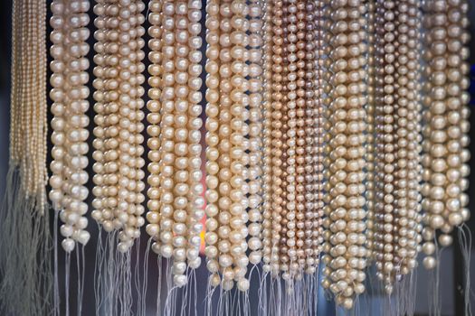 strings of beads from natural freshwater pearls in market close to Yu Garden, Shanghai, China