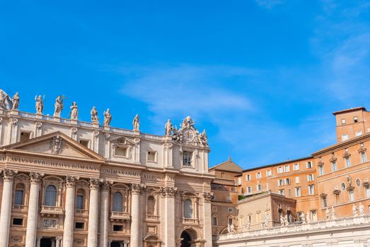 St Peter's Basilica on blue sky background. Vatican, Italy