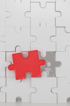 3D illustration,3D rendering,The character is wearing the last piece of the jigsaw puzzle to complete the mission. Includes selection path of floor and background.