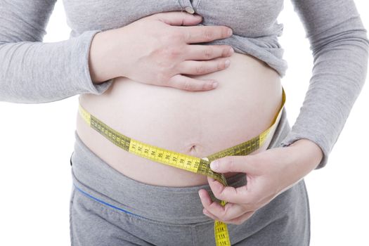 Closeup of pregnant woman at white background