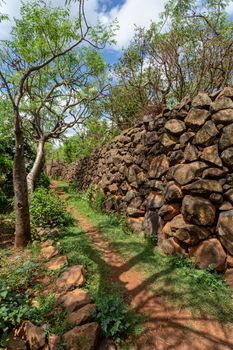 Narrow pathway in Konso, walled village tribes Konso. Africa, Ethiopia. Konso villages are listed as UNESCO World Heritage sites.