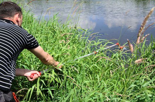 Take samples of water for laboratory testing. The concept - analysis of water purity, environment, ecology