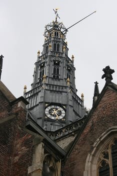 Clock tower of the Grote Kerk in Amsterdam, Netherlands