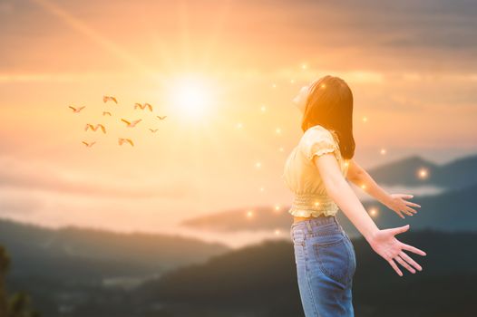 Freedom And Healthy a girl stretching her arms in the sun