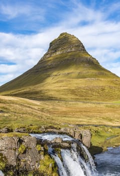 Kirkjufellsfoss Waterfall with Kirkjufell mountain in the background, Iceland