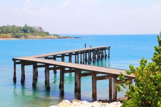 Wooden bridge to a tropical beach on island with blue sky, at khao laem ya mu koh samet island Rayong Thailand.
Thailand.