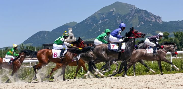 PYATIGORSK, RUSSIA - JUNE 30,2013: Horse race for the Letni prize of the oldest racecourses in Russia, Northern Caucasus.