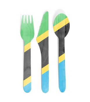 Eco friendly wooden cutlery - Plastic free concept - Isolated - Flag of Tanzania