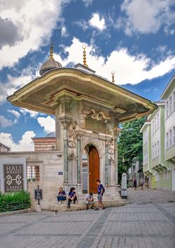 Istambul, Turkey – 07.12.2019. Carpet Museum near the Entrance gate to the Topkapi Palace in Istanbul, Turkey, on a cloudy summer day.