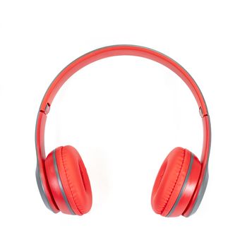 The close up of Modern red wireless headphone isolated on white background.