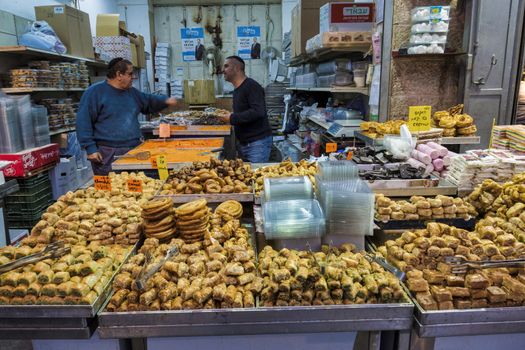 Jerusalem,Israel,29-march-2019:man selling the sweet candy in the souk in Jerusalem, the souk is the most famous market in Jerusalem