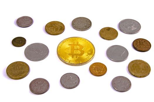 Bitcoin golden on top of other coins isolated on white background clipping path