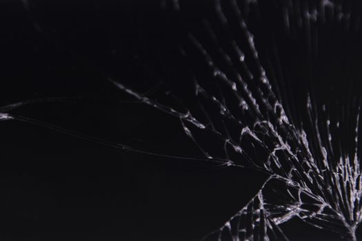 crash glass black background abstract broken closeup
